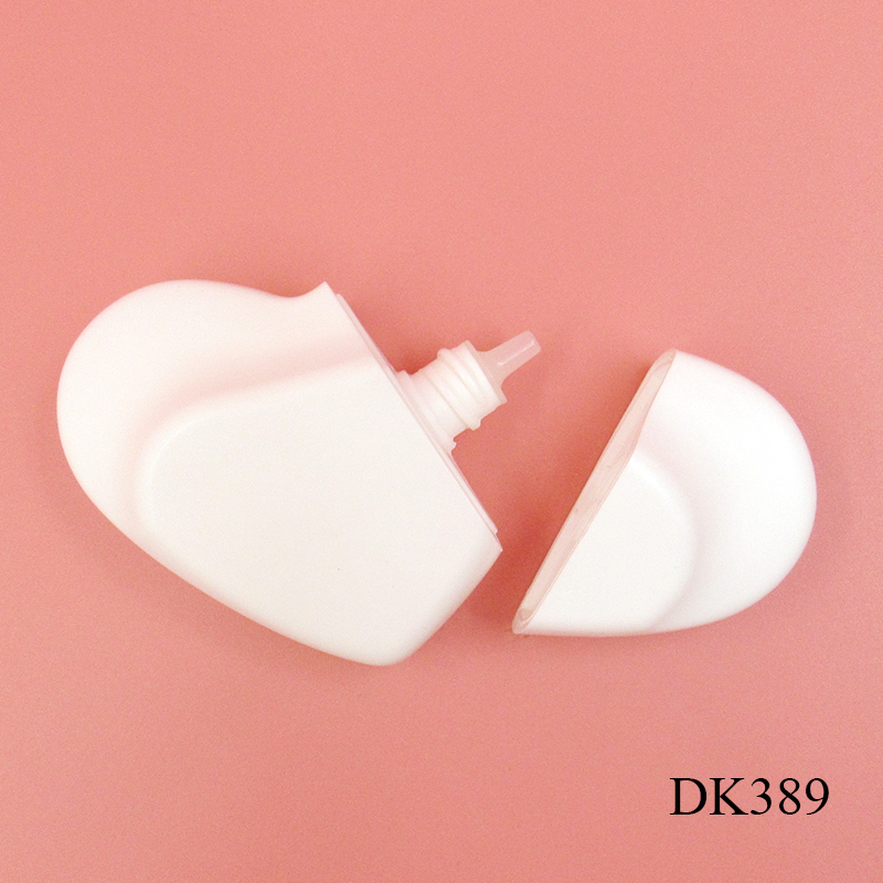 Lotion bottle cosmetic packaging 50ml white heart-shaped plastic hand cream bottle, extrusion type container printing custom