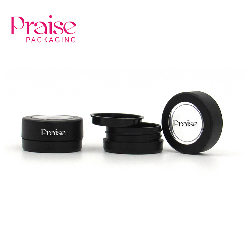 Small round black plastic jar with cover, for cream/cosmetics/samples/ointments and other beauty products