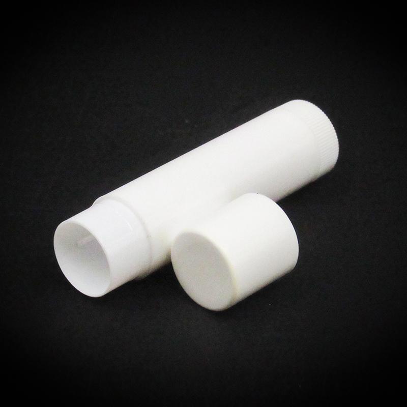 Simple white plastic lip balm container with circular empty lip balm tube rotating at the bottom for DIY makeup