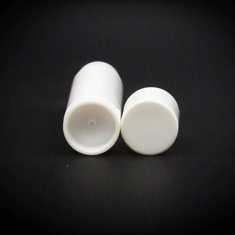 Simple white plastic lip balm container with circular empty lip balm tube rotating at the bottom for DIY makeup